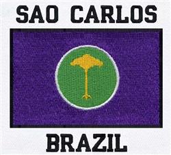 Textured embroidery flag emblem featuring a yellow tree symbol within a green circle on a vibrant purple background.