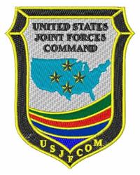 Shield patch featuring a blue United States map, five stars above, green and red stripes, and 'UNITED STATES JOINT FORCES COM