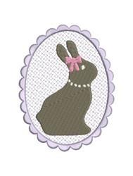 Whimsical rabbit silhouette in light purple oval frame, adorned with a pink bow and pearl necklace, perfect for Easter.
