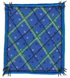 Applique checkered patch with blue background, green stripes, and black lines, featuring playful dots for texture.