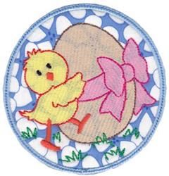 Applique yellow chick with a pink bow and a beige egg against a playful blue background, perfect for Easter.