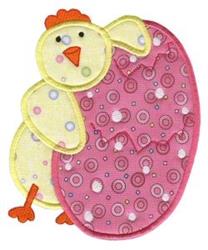 Applique yellow chick with a red comb next to a pink egg adorned with polka dots, perfect for Easter.
