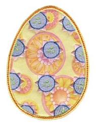 Applique Easter egg with bright floral patterns in pastel colors, surrounded by circular motifs on a soft yellow background.