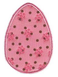 Applique pink egg with brown polka dots and floral patterns on a cheerful background, perfect for Easter.