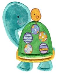 Applique turtle with a colorful shell and eggs, topped by a yellow chick, vibrant festive design for Easter.