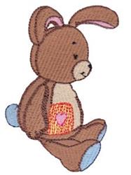 Cute brown bunny with a heart on its belly and light pink inner ears, perfect for Easter decor.
