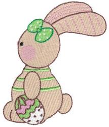 Cute bunny wearing a striped shirt and green bow, holding a decorated Easter egg in pastel colors.
