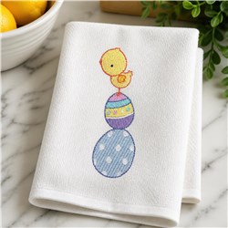 Cheerful yellow duckling on colorful eggs; blue polka-dotted and purple striped for a playful Easter theme.