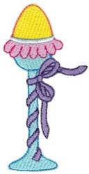 Decorative candlestick featuring a tall blue silhouette, topped with a yellow egg, charming pink petals, and wrapped in a pur