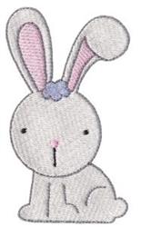 Playful rabbit in soft grey fur with pink ears and a blue flower, perfect for Easter decor.