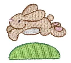 Cute rabbit leaps mid-air with detailed light brown fur and lively ears, set on a green patch for Easter.
