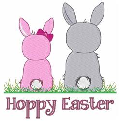 Cute pink and gray bunnies sitting on grass with 'Hoppy Easter' text below, perfect for festive spring decor.