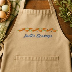 Whimsical apron in light beige with cheerful carrots and blue 'Easter Blessings' text, perfect for seasonal celebrations.
