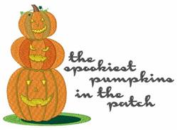 A whimsical stack of three orange pumpkins with unique faces rests on green leaves, perfect for Halloween decor.