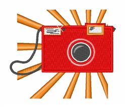 Red camera with a bold circular lens and black detailing, against vibrant orange and yellow rays.