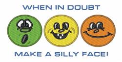 Three cartoonish face icons in bright green, yellow, and orange, each with unique, cheerful expressions. Fun design.