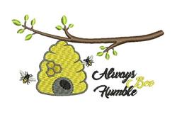 Vibrant bee hive with a black door under leafy branch, featuring playful 'Always Bee Humble' text.