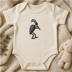Whimsical bird playing a flute on a soft beige onesie with dark outlines, surrounded by cozy soft toys.