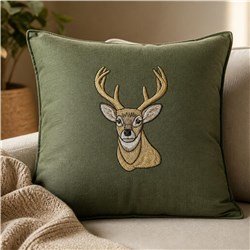 Realistic embroidered deer head on a green cushion, featuring detailed facial features and antlers.