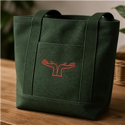 Modern tote bag with deep green fabric and red embroidery of two stylized hands, perfect for everyday use.
