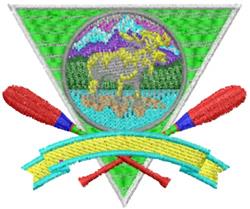 Colorful moose with vibrant stitching on a green triangle background, crossed paddles below, set against mountains.