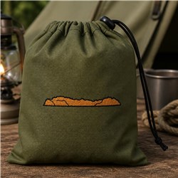 Green drawstring bag featuring a minimalistic mountain range design in orange, with camping lantern and metal cup.