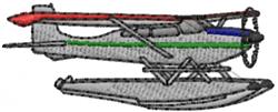 Detailed seaplane with a grey body, vibrant red wings, blue top fin, and white floats in colorful embroidery.