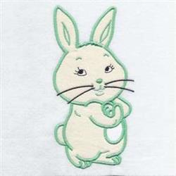 Applique rabbit with large ears and cheerful whiskers, in light colors perfect for playful Easter decor.