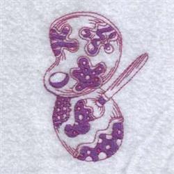 FSL decorative Easter egg with intricate purple patterns and a paintbrush, embodying a whimsical Easter theme.