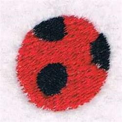 Playful ladybug applique with bright red circular shape and bold black spots, perfect for children's decor.