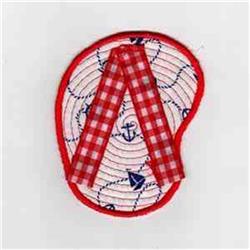 Nautical patch with red gingham ribbon shaped like an 'A', featuring vibrant blue anchors and sailboats.