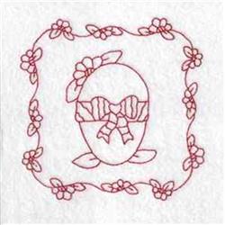 Redwork decorative egg with facial features and a bow, framed by floral elements, perfect for Easter decor.