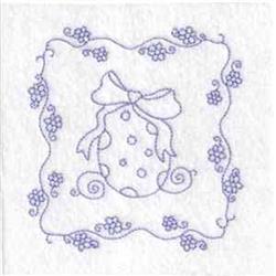 Redwork decorative egg featuring playful polka dots, a lovely bow, and floral motifs, perfect for Easter.