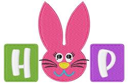 Playful pink bunny head with expressive eyes and long ears, flanked by colorful blocks with letters H and P, perfect for East