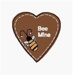 Playful heart with 'Bee Mine' text in white, alongside a cartoon bee, perfect for Valentine's Day.
