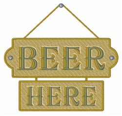 Vintage decorative sign reading 'BEER HERE' with bold lettering and textured surface, hanging in a rustic style.