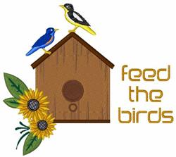 Playful birdhouse with a bluebird and goldfinch, surrounded by sunflowers, capturing a colorful spring theme.