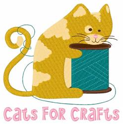 Playful cat with light brown and cream fur, leaning on a blue spool of thread in a whimsical design.