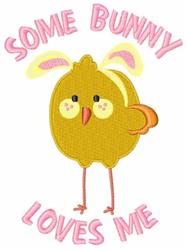 Cute chick with pink bunny ears and white eyes, featuring playful text 'SOME BUNNY LOVES ME' for Easter.
