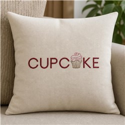 Beige pillow with bold red 'CUPCAKE' text and pink cupcake graphic, perfect for playful kitchen decor.