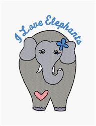 Cartoon applique elephant with gray body, blue flower, and pink heart. Features cheerful text above.