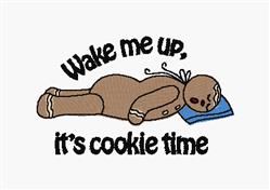Playful gingerbread cookie character on a blue pillow, with bold text ‘Wake me up, it’s cookie time.’ Holiday theme.