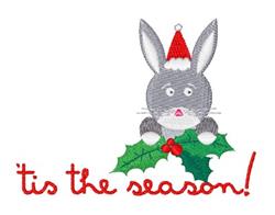 Playful gray rabbit in a red Santa hat peeking over holly leaves with 'tis the season!' in festive red.