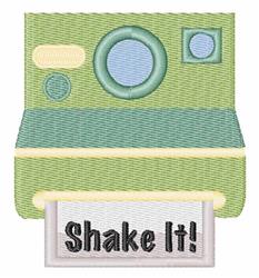 Playful green camera with blue accents and bold 'Shake It!' text, a cheerful design for photography lovers.