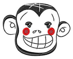 Playful cartoon monkey face with black and white colors, red cheeks, and a big smile for machine embroidery.