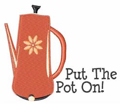 Whimsical orange coffee pot with playful flower design and 'Put The Pot On!' text, creating a cheerful kitchen vibe.