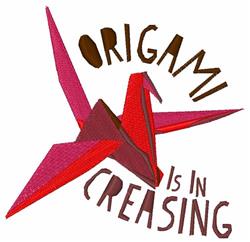 Colorful applique origami crane in vibrant red, showcasing sharp folds with playful brown lettering.