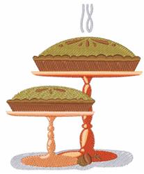 Two vibrant pies on cake stands with golden brown crusts and green fillings, steam rising in a festive holiday display.