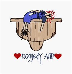 Colorful rag doll with red yarn hair, wearing a blue dress, atop a wooden spool with red hearts.