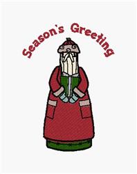 Whimsical figure in a red coat holding a book against a green base with 'Season's Greeting' embroidered, festive charm.
